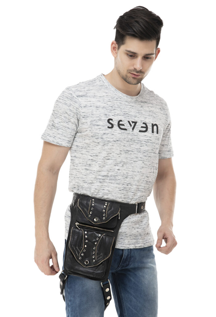 Black tactical leather thigh bag with two riveted zip compartments and leg strap by Dario Lario