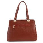 Blue croc-embossed leather handbag with double handles, placed in soft natural light with flowers nearby — a premium, handcrafted accessory by Dario Lario.