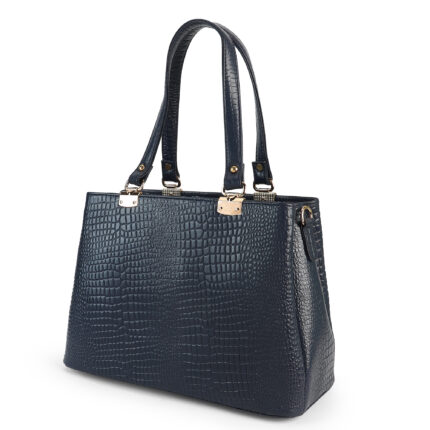 Blue croc-embossed leather handbag with double handles, placed in soft natural light with flowers nearby — a premium, handcrafted accessory by Dario Lario.