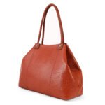 Bring warm sophistication to your everyday look with this Tan Croc-Texture Large Tote Bag. Featuring a premium croc-embossed texture, smooth finish, and soft structure, it blends effortless style with practical functionality. The spacious interior makes it perfect for work, shopping, or travel—carry your laptop, essentials, and more with ease. Finished with braided handles for added charm, this tote is designed to suit every outfit and every day.