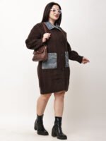 “Brown croc-textured leather sling bag with top handle and twist-lock closure.”