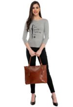 Tan leather tote bag with spacious interior and classic shoulder handles