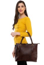 Brown genuine leather tote bag with double shoulder handles and structured design on white background